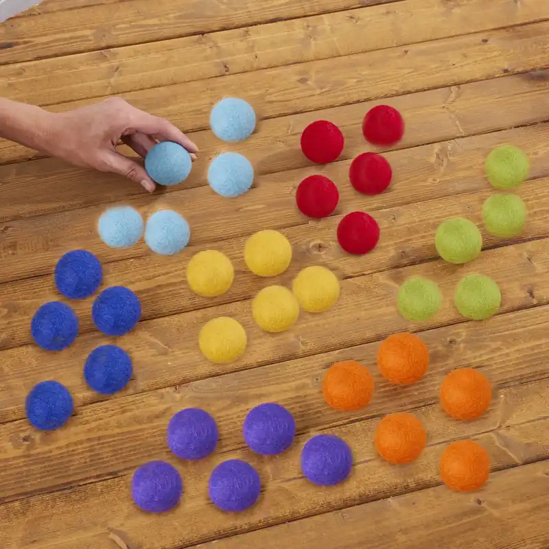 Aanbieding Cosy - Vilten Regenboogballen